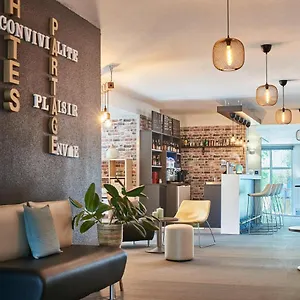 Kyriad Gare - Grand Palais Hotel